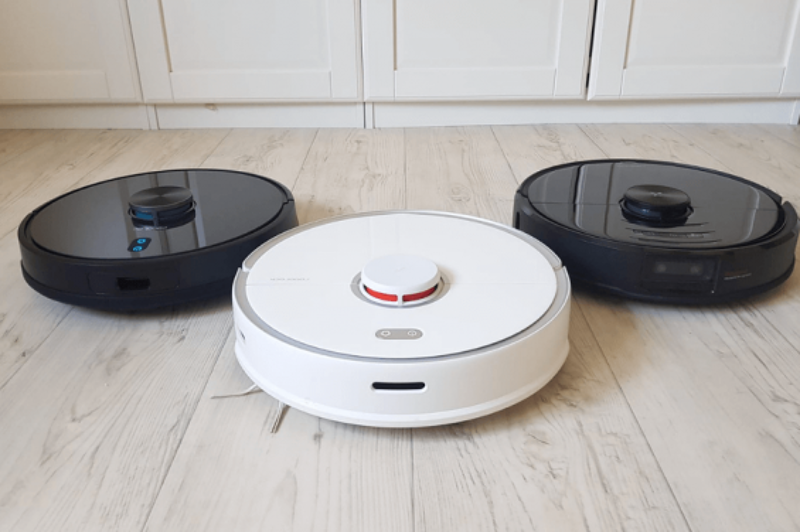Three vacuum robots side by side